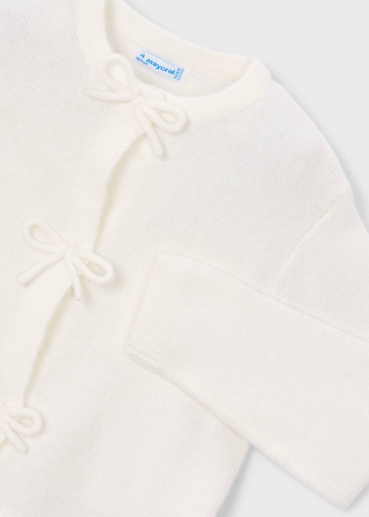 Girls' knitted cardigan with bows