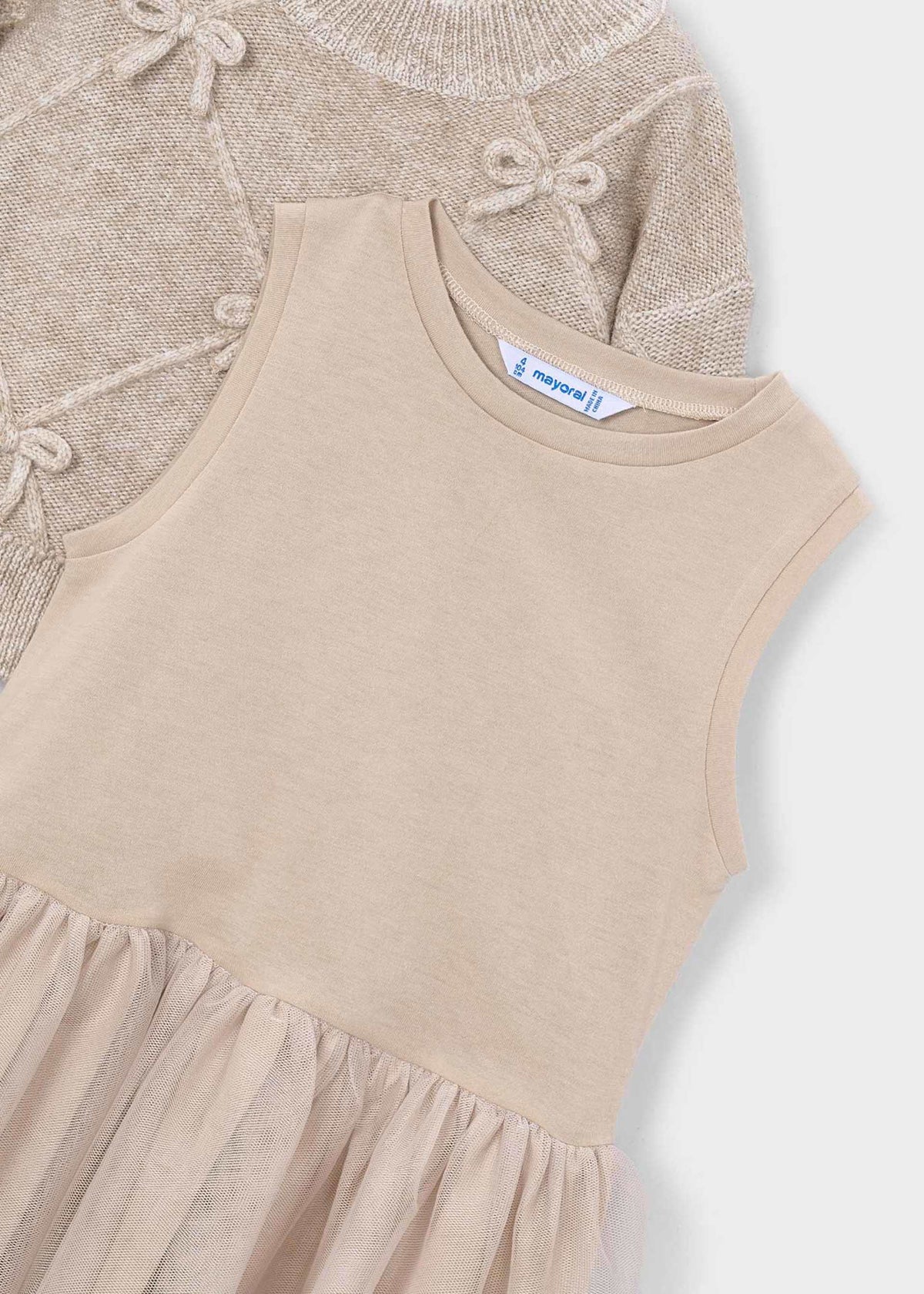 Girls' knitted dress with bows